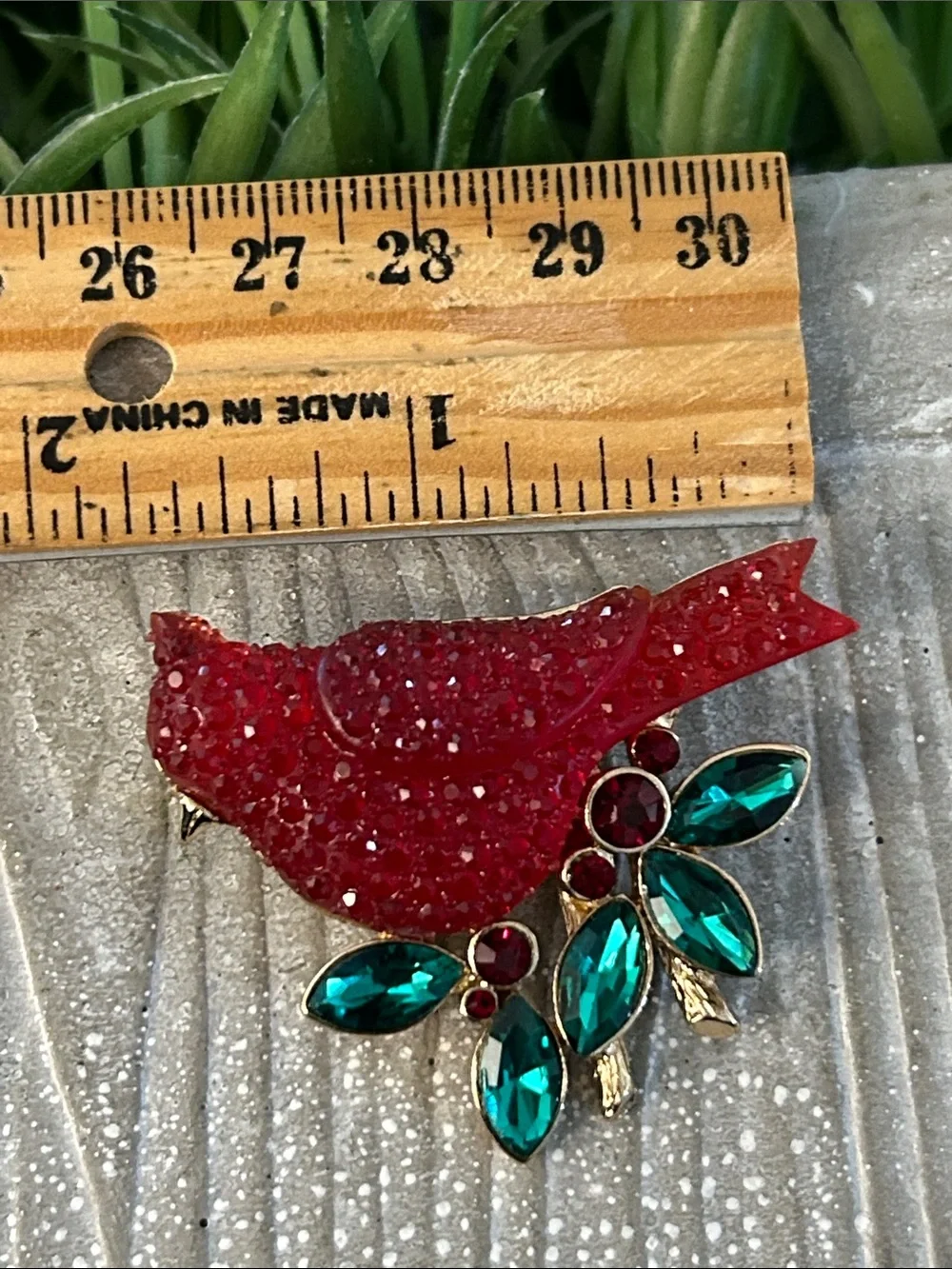 Red Cardinal Crystal Brooch with Emerald Green leaf Accents in goldtone branch